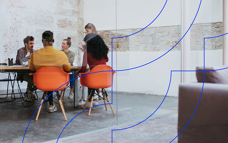 a group of people sitting at tables